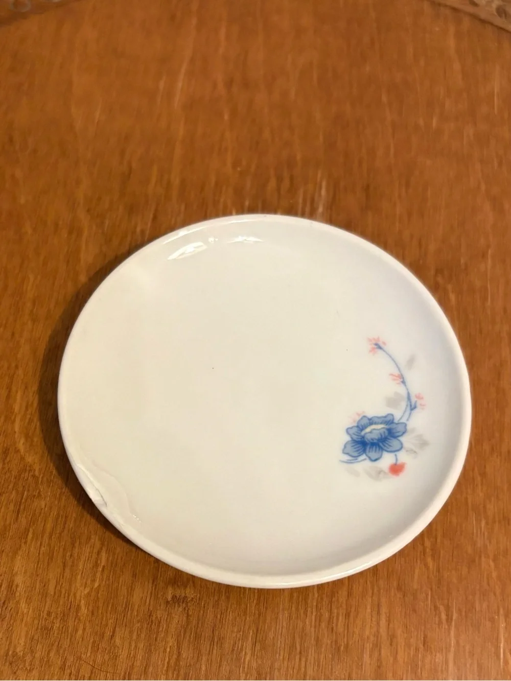 Butter Pat White with Blue Floral Accent